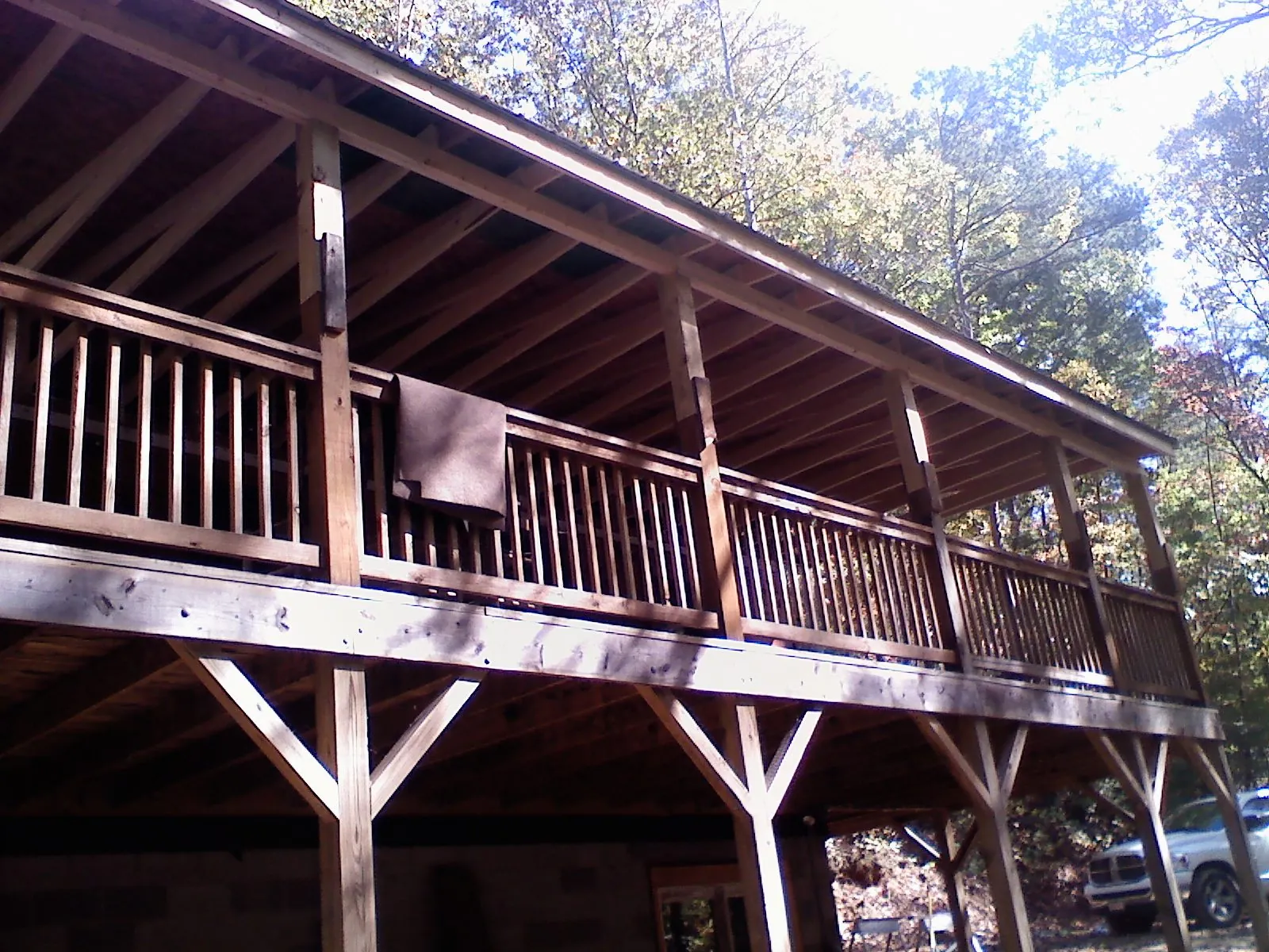 Timber framing under a new elevated porch and deck — Roof Leak Repair in Blue Mounds by Roofing Brothers
